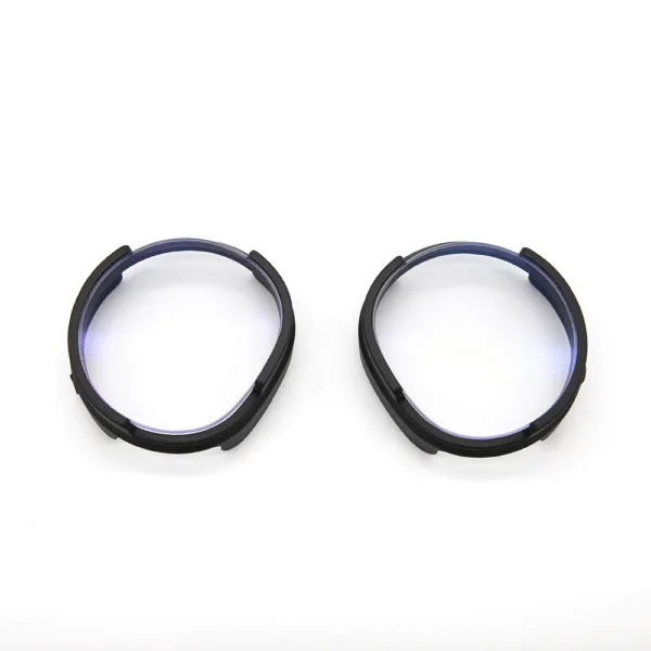 Pair of anti-glare prescription lenses for Pimax Crystal laid out for inspection