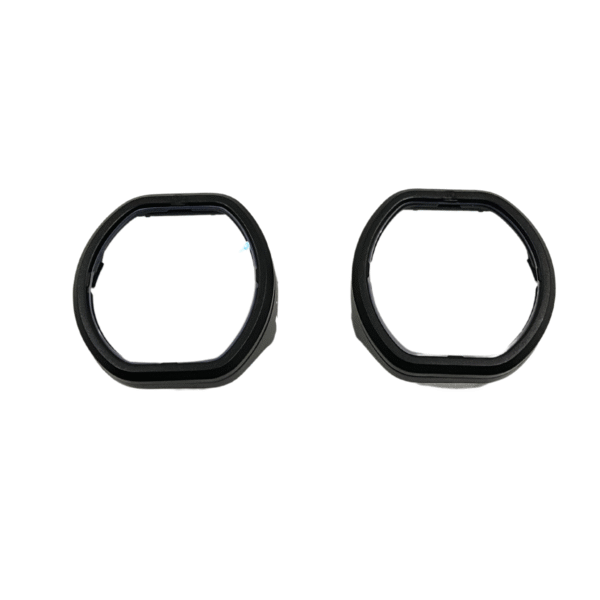 Top-down view of four PSVR 2 prescription lens frames for left and right eyes