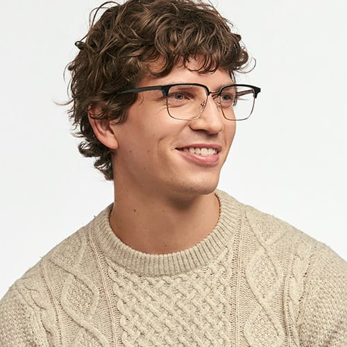 psvr2-prescription-lenses-guide 13 Smiling VR gamer wearing glasses, representing comfort, clarity and protection with PSVR2 prescription lenses