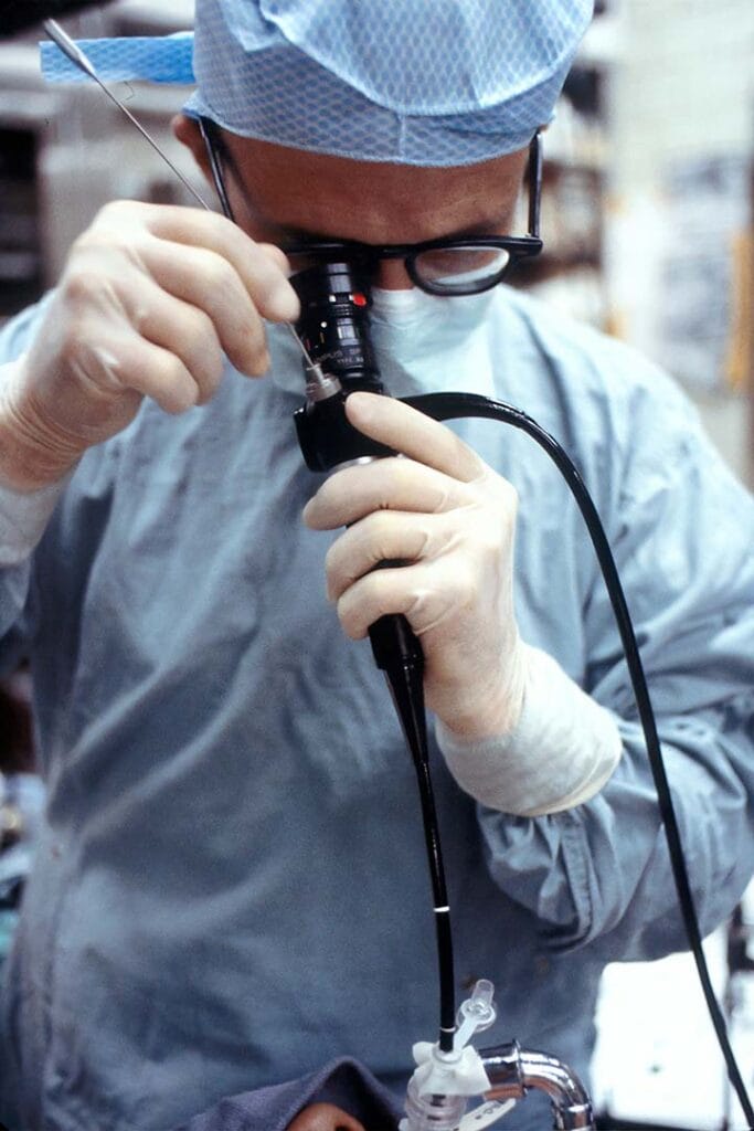 An eyewear specialist fitting prescription lenses into Meta glasses