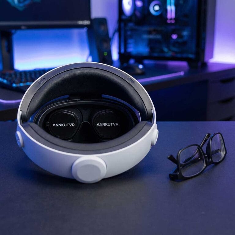 PS VR2 headset fitted with ANNKUTVR prescription lens inserts sitting next to a pair of discarded glasses.