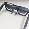 Rear angled view of ROG XREAL R1 glasses with the prescription lens insert installed